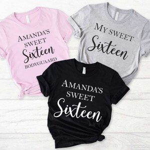 May include: Three t-shirts with different text designs. The pink shirt says "Amanda's Sweet Sixteen Bodyguard". The gray shirt says "My Sweet Sixteen". The black shirt says "Amanda's Sweet Sixteen".