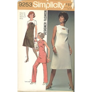 May include: Simplicity pattern 9253 for a sleeveless dress and tunic with a keyhole neckline. The envelope displays illustrations of a dark dress with a light bodice, a solid pink tunic with matching trousers, and a white sleeveless dress.