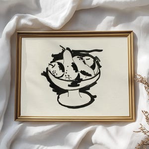 May include: A black and white ink drawing of a bowl of fruit. The bowl is filled with pears and apples. The drawing is framed in a gold frame.