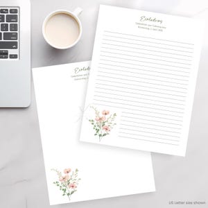 May include: White stationery with floral accents and lined pages. The text "Einladung" is printed in gold script. A cup of coffee and a laptop keyboard are visible in the background. US Letter size shown.