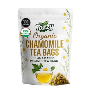 May include: A white resealable pouch with a green and white label that reads "Tozzy Organic Chamomile Tea Bags Plant-Based Pyramid Tea Bags". The label also includes a USDA Organic seal and a graphic of a chamomile flower. The pouch contains 100 tea bags.