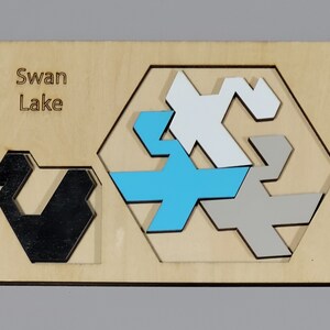 Swan Lake. Wooden brainteaser puzzle
