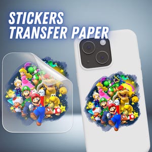 May include: White phone case and sticker sheet featuring a colorful illustration of video game characters. The sticker sheet is partially peeled back, revealing the design. The text "STICKERS TRANSFER PAPER" is at the top.