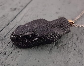 Black Rattlesnake Head Necklace hand 