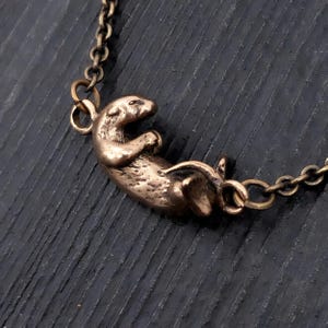 Floating Otter Pendant Charm Necklace , Solid Jewelers Bronze