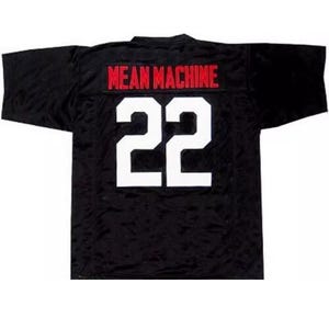 以下が含まれることがあります： 黒のフットボールジャージ。背面に「MEAN MACHINE」の文字と白い数字「22」が書かれている