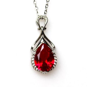 6.375 ct Blood Red Hydrothermal Ruby - Silver Pendant with Zircons + Chain