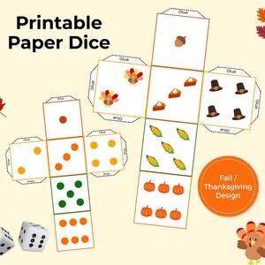 May include: Printable paper dice with a fall and Thanksgiving design. The dice feature illustrations of a turkey, pie, corn, pumpkins, and pilgrim hats. The text "Printable Paper Dice" is at the top, and the text "Fall / Thanksgiving Design" is in a circle.
