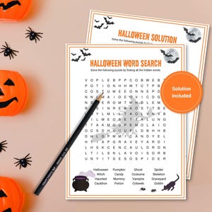 Halloween Word Search page, Halloween Word Search Solution page, and a pencil are shown along with plastic orange pumpkins and black spiders. An orange circle displays, "Solution included".