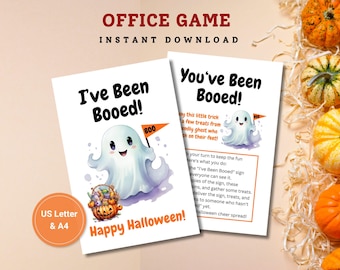 May include: Two printable cards for an office Halloween game. The cards feature a friendly cartoon ghost with a bucket of candy and the text "I've Been Booed!" and "You've Been Booed!"