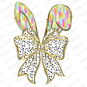 May include: A white bow with black polka dots and gold trim. The bow is tied with a large, gold ribbon. The bow is topped with two bunny ears with a pink, blue, and yellow abstract pattern.