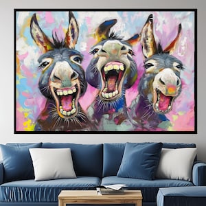 May include: Three donkeys with colourful, expressive faces are painted against a pink and blue background. The donkeys are all laughing with their mouths open, showing their teeth. The painting is done in a vibrant, impressionistic style.