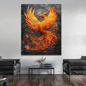 May include: A large, textured painting of a phoenix in shades of orange and yellow against a dark background. The bird is depicted with outstretched wings and flowing tail feathers, creating a dynamic and artistic composition. The artwork is displayed on a wall.