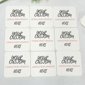 May include: Nine white square coasters with black text that reads "Your Custom Logo/Text/Photo Here".