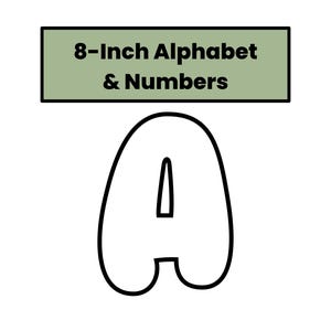 Puede incluir: Una gran letra "A" blanca con un contorno negro, debajo de un rectángulo verde con el texto "8-Inch Alphabet & Numbers". La letra mide aproximadamente 20 cm de alto.
