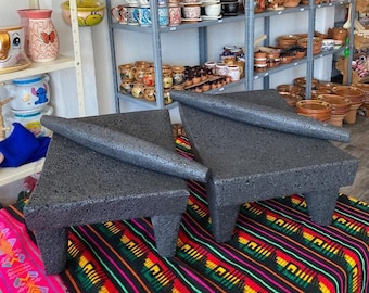 Hermoso metate hecho de piedra volcánica