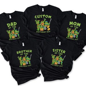 May include: Black t-shirts with green text and graphics of Teenage Mutant Ninja Turtles. The shirts read "DAD OF THE BIRTHDAY BOY", "CUSTOM 5 BIRTHDAY BOY", "MOM OF THE BIRTHDAY BOY", "BROTHER OF THE BIRTHDAY BOY", and "SISTER OF THE BIRTHDAY BOY".