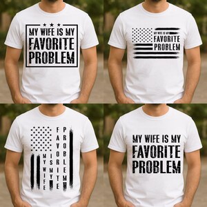 以下が含まれることがあります： 黒いグラフィックプリントが施された4枚の白い半袖Tシャツのコレクション。デザインには「MY WIFE IS MY FAVORITE PROBLEM」というテキストが様々なレイアウトで配置されており、一部にはアメリカ国旗の要素やかすれた文字のデザインが取り入れられています。