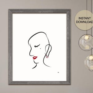 May include: A framed minimalist art print. It features a black line drawing of a woman's profile with red lipstick and earrings. The artwork is set against a white background and framed in grey. The words "INSTANT DOWNLOAD" are in a circle.