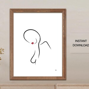 May include: A framed minimalist art print featuring a black line drawing of a figure with red lips. The artwork is set against a white background and includes the text "INSTANT DOWNLOAD". The frame is a warm brown color.