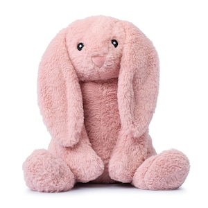 May include: A plush pink bunny rabbit toy with long floppy ears. The bunny is sitting with its paws tucked in front of it.