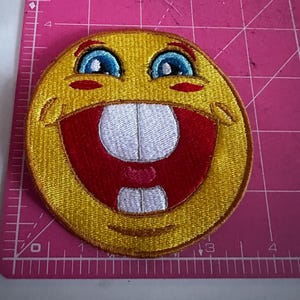 smiling big teeth emoji funny yippie embroidered patch 4”x3.5”