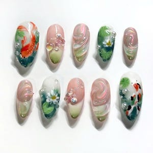 nail art, press on nails, fake nails, free style nails, unique design nails, custom nails, trendy nails, statement nails, hand-painted nails, elegant nails, party nails, french tip nails, koi nails, koi fish nails, lotus nails, Asian nail art