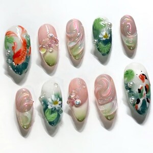 nail art, press on nails, fake nails, free style nails, unique design nails, custom nails, trendy nails, statement nails, hand-painted nails, elegant nails, party nails, french tip nails, koi nails, koi fish nails, lotus nails, Asian nail art
