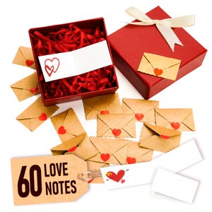 May include: A red gift box with a white ribbon bow, open red box with red paper filler, and several small brown envelopes with red heart seals. A tag reads "60 LOVE NOTES".