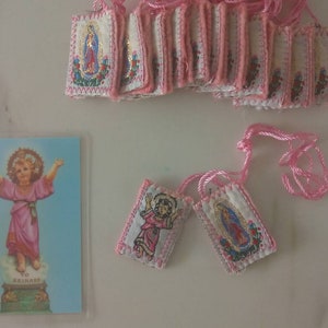 Juego de 12 escapularios del Niño Jesús en color rosa/Juego de 6