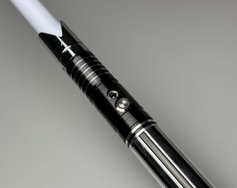 Star Wars Lightsaber/Laser Sword Black/Silver with Vibration- 16 Color Modes
