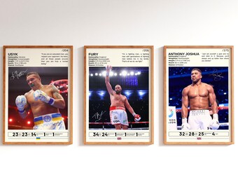 May include: Three framed prints featuring professional boxers. Each print includes a portrait, signature, and statistics. The boxers are Usyk, Fury, and Anthony Joshua. The prints are in wooden frames and are displayed against a white background.
