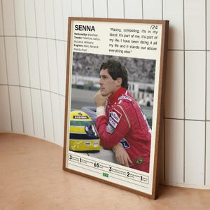 May include: A framed poster featuring a photo of Ayrton Senna, a Brazilian Formula One racing driver. The poster includes Senna's name, nationality, teams, engines, and a quote from him: "Racing, competing, it's in my blood. It's part of me, it's part of my life; I have been doing it all my life and it stands out above everything else."