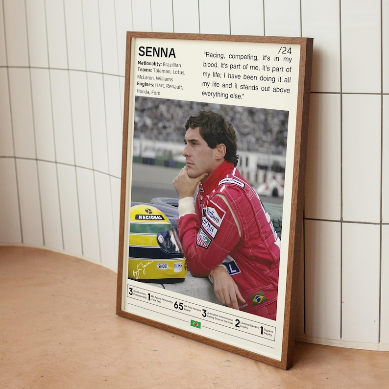 May include: A framed poster featuring a photo of Ayrton Senna, a Brazilian Formula One racing driver. The poster includes Senna's name, nationality, teams, engines, and a quote from him: "Racing, competing, it's in my blood. It's part of me, it's part of my life; I have been doing it all my life and it stands out above everything else."