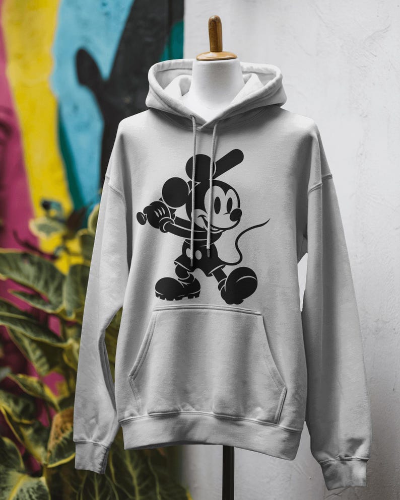Mickey Mouse-themed baseball design featuring Mickey silhouettes and baseball clipart. Includes SVG and PNG files, perfect for crafting, t-shirts, and sports-themed decorations. Ideal for Disney fans creating fun, baseball-inspired projects.