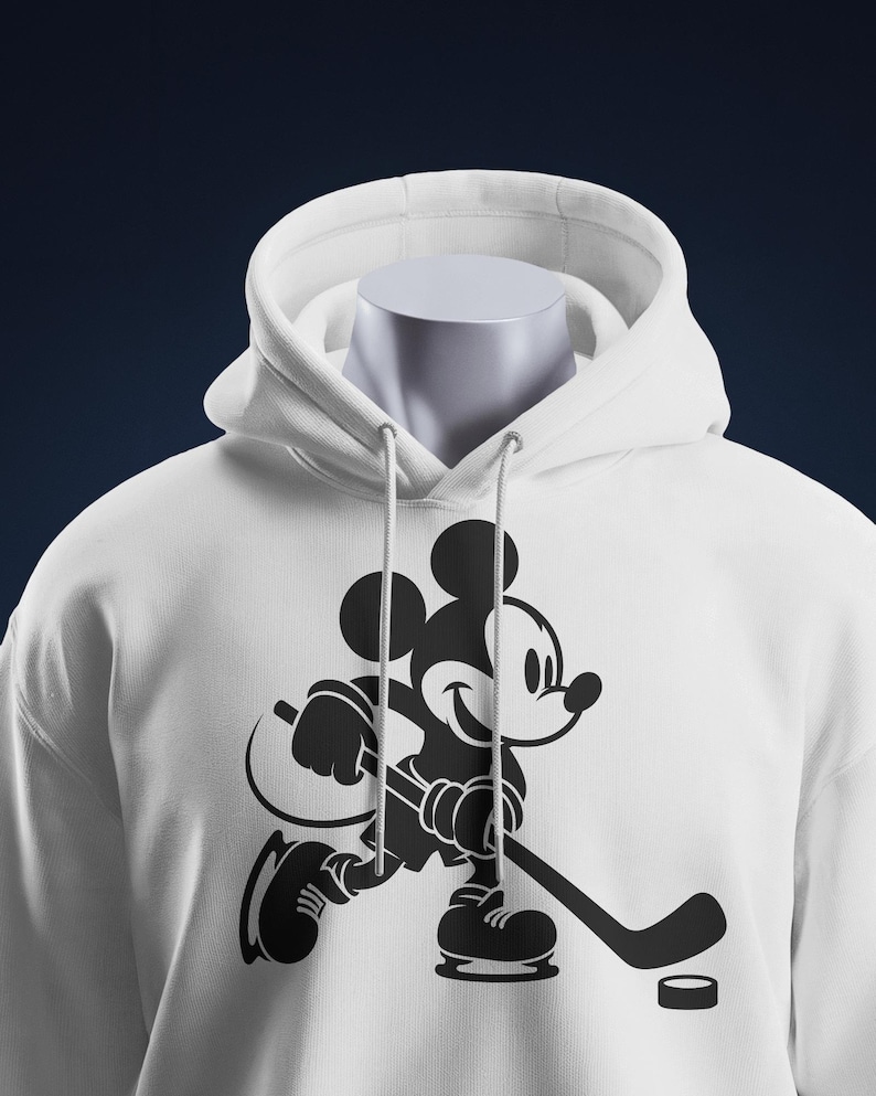 Ice hockey-themed design featuring Mickey Mouse with hockey player silhouettes and clipart. Includes SVG and PNG files, perfect for crafting, t-shirts, and sports-themed decorations. Ideal for Disney fans creating fun, hockey-inspired projects.