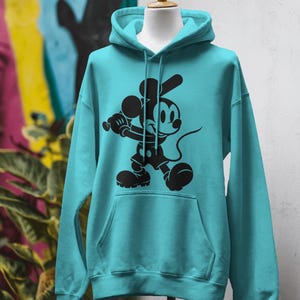 Mickey Mouse-themed baseball design featuring Mickey silhouettes and baseball clipart. Includes SVG and PNG files, perfect for crafting, t-shirts, and sports-themed decorations. Ideal for Disney fans creating fun, baseball-inspired projects.