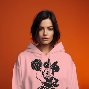 Minnie Mouse-themed cheerleading design featuring pom-poms and cheerleader silhouettes. Includes PNG and SVG files, perfect for crafting, t-shirts, and cheer mom-themed decorations. Ideal for fans of Minnie Mouse and cheerleading projects.