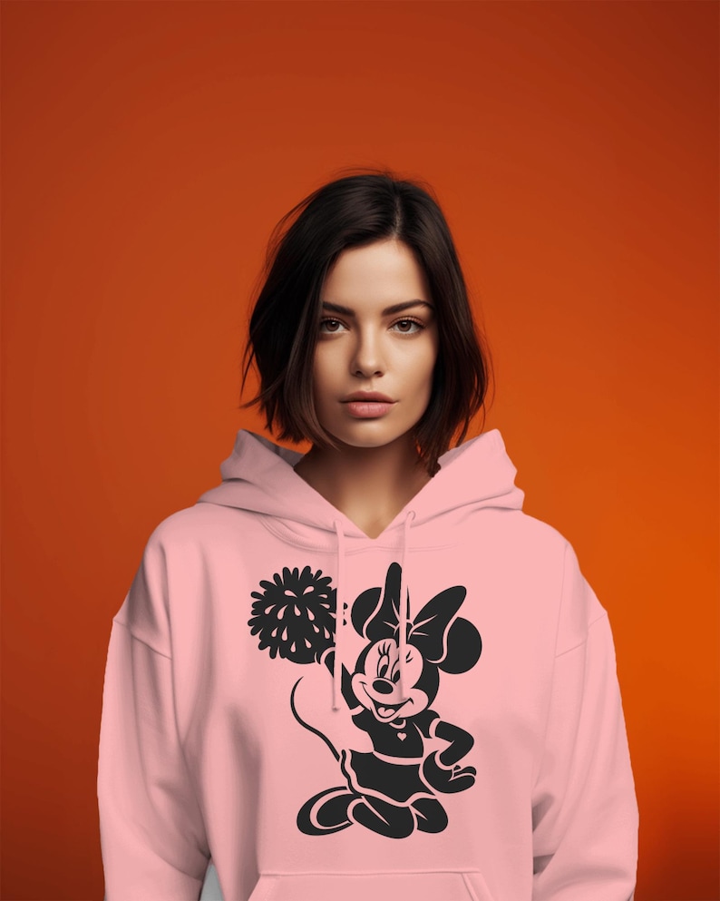 Minnie Mouse-themed cheerleading design featuring pom-poms and cheerleader silhouettes. Includes PNG and SVG files, perfect for crafting, t-shirts, and cheer mom-themed decorations. Ideal for fans of Minnie Mouse and cheerleading projects.