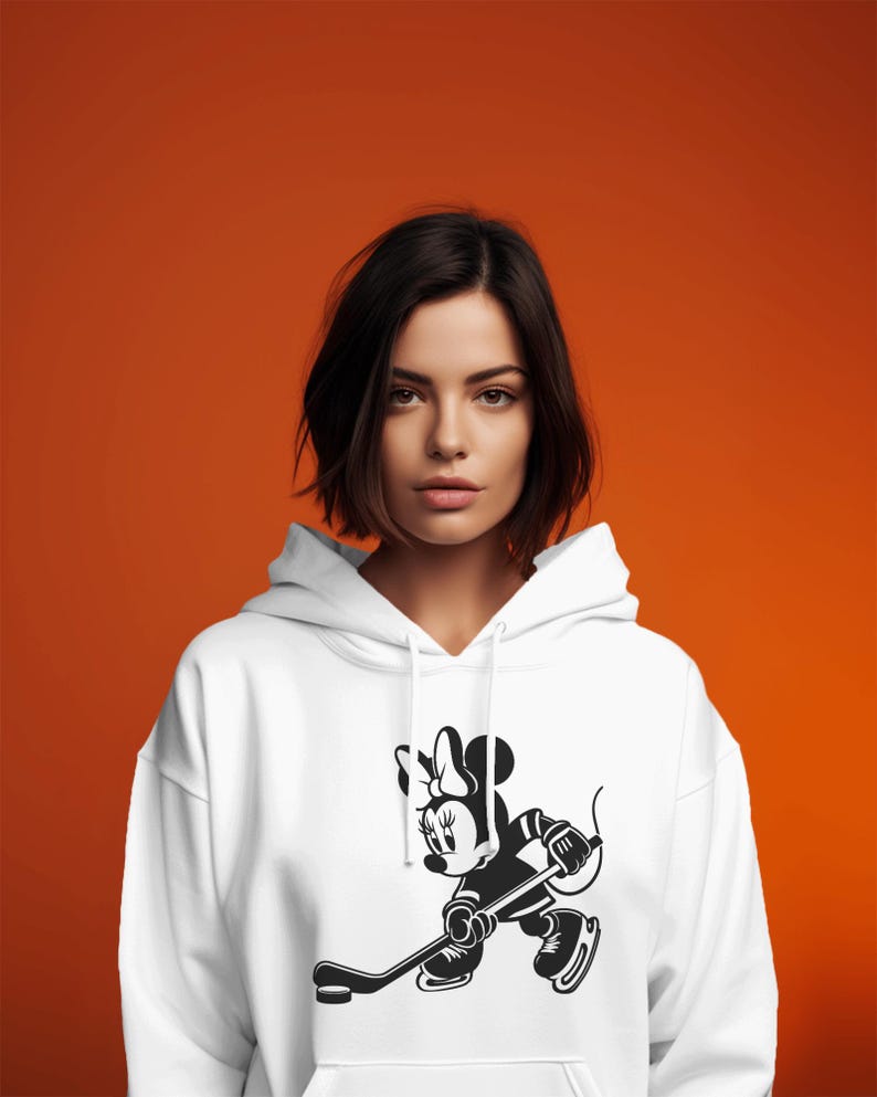 Minnie Mouse-themed ice hockey design featuring Minnie silhouettes and hockey clipart. Includes PNG and SVG files, perfect for crafting, t-shirts, and sports-themed decorations. Ideal for Disney fans creating fun, ice hockey-inspired projects.