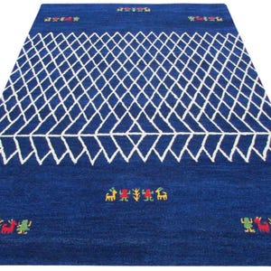 Handmade carpet 100% wool 160 x 230 cm blue oriental carpet hand tufted T803