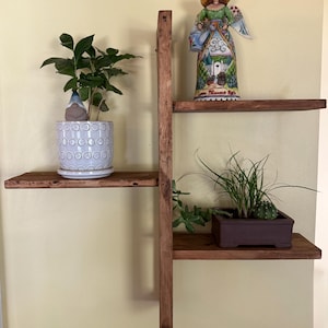 Rustic Reclaimed Wood Wall Shelf: Asymmetrical Three-Tier Display