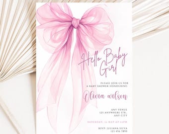 May include: A baby shower invitation with a large, sheer pink bow at the top. The words "Hello Baby Girl" are written in elegant script. Additional text includes the honoree's name, event details, and RSVP information.