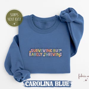 Surviving But Barely Thriving Sweatshirt: Cancer Survivor Gift