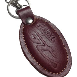 Portachiavi ovale in pelle italiana GTS super Vespa fatto a mano, Made in Italy, disponibile nei colori nero o marrone, GTS 300, GTS 125, idea regalo