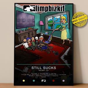 May include: A framed poster featuring a cartoon illustration with the text "STILL SUCKS" and the band name "limpbizkit". The artwork depicts a room with figures on a rug, a woman vacuuming, and a window view. The poster includes a "HIGH QUALITY" sticker.