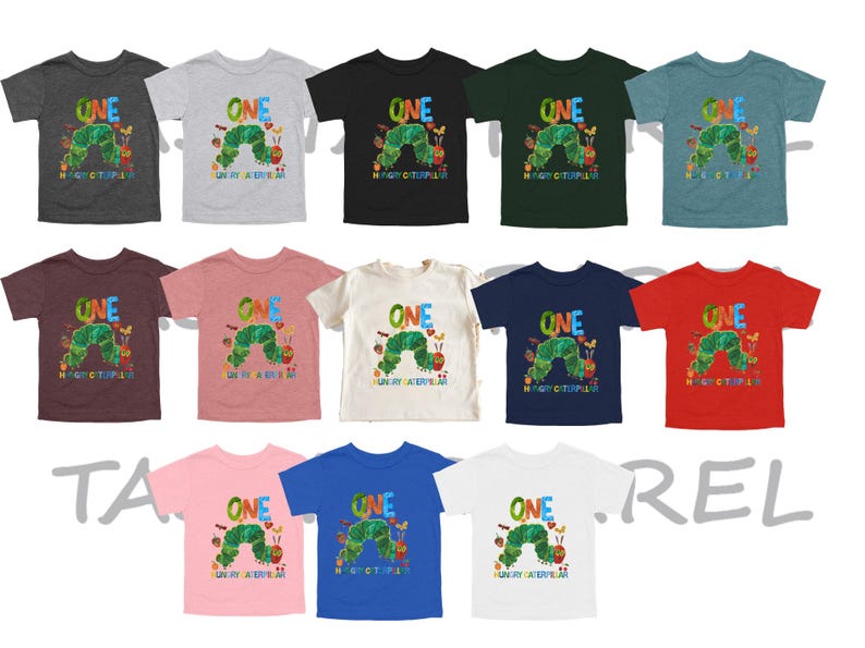 May include: A collection of children's t-shirts in various colors, each featuring a colorful graphic of a caterpillar and the text "ONE" and "Hungry Caterpillar". The shirts are short-sleeved.