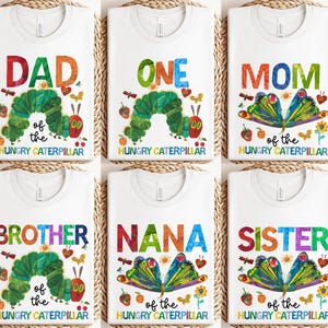May include: White t-shirts with colorful text and illustrations from "The Very Hungry Caterpillar." Designs include "DAD," "ONE," "MOM," "BROTHER," "NANA," and "SISTER." Each shirt features a caterpillar or butterfly design.