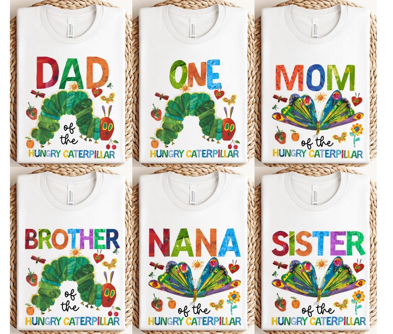May include: White t-shirts with colorful text and illustrations from "The Very Hungry Caterpillar." Designs include "DAD," "ONE," "MOM," "BROTHER," "NANA," and "SISTER." Each shirt features a caterpillar or butterfly design.