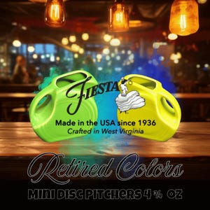 May include: Two Fiestaware mini disc pitchers, one green and one yellow, with the Fiestaware logo and the text "Made in the USA since 1936 Crafted in West Virginia". The pitchers are on a wooden surface and the text "Retired Colors MINI DISC PITCHERS 4 3/4 OZ" is below them.